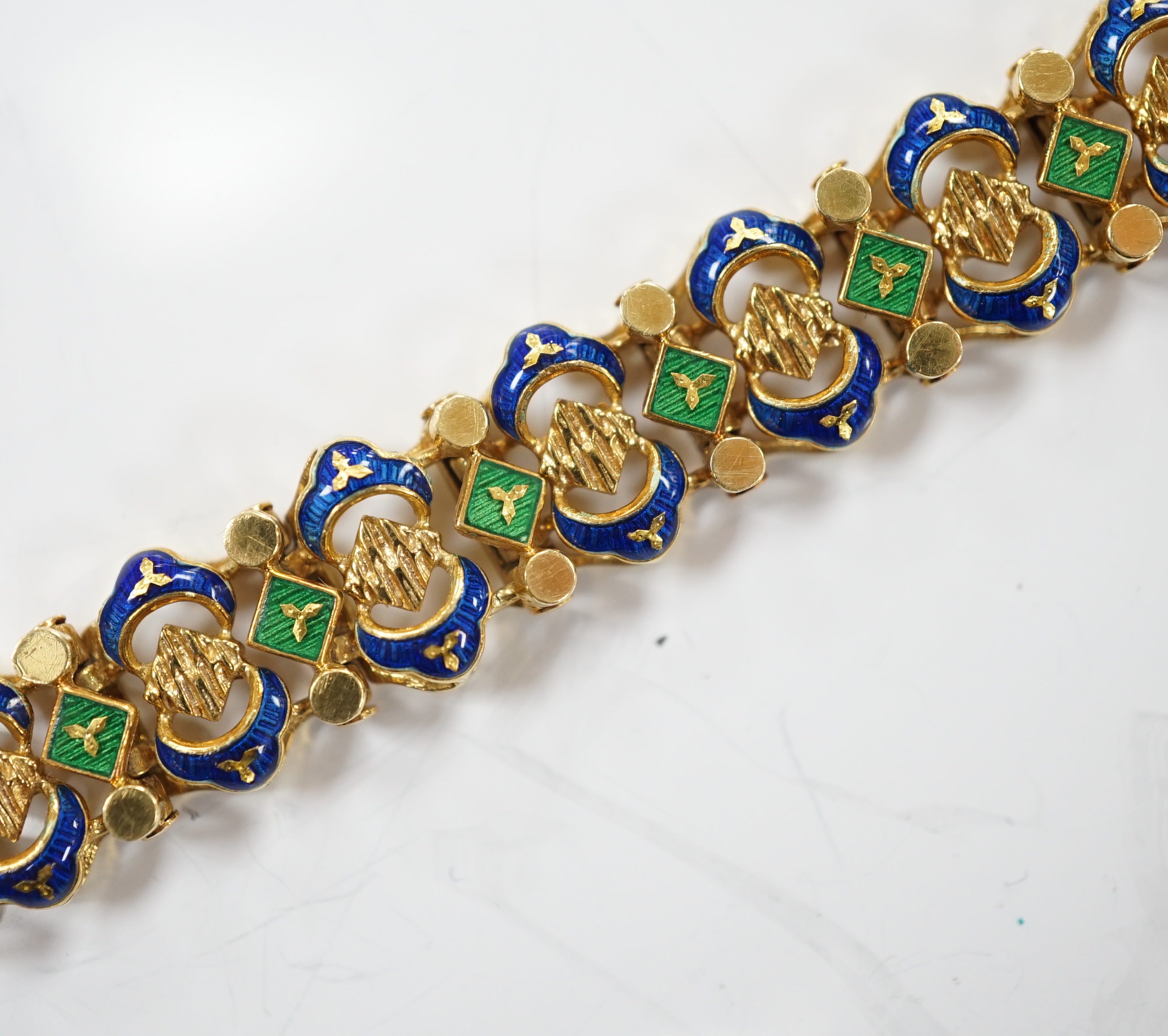 A 20th century Italian Uno-A-Erre 750 and two colour enamel set bracelet, 19cm, gross weight 33.4 grams.